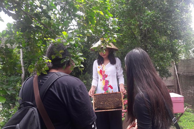 1-day Mekong Delta Tour: Cai Be Market, Local Island and Cycling - The Sampan Ride: Small Boat, Big Perspective Shift