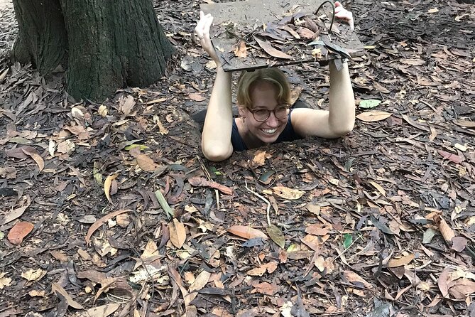 6 Hours Historical Tour in Cu Chi Tunnel with Free Snack - Inside the experience: documentary, booby traps, and the short tunnel crawl