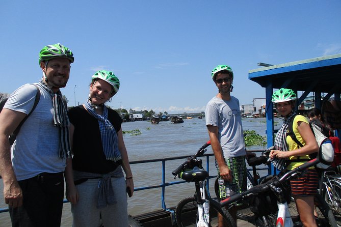 Adventure awaits – Two days Mekong Outdoor Activities. - Day 2: Cai Be Floating Market, ferries, and Vinh Long village cycling
