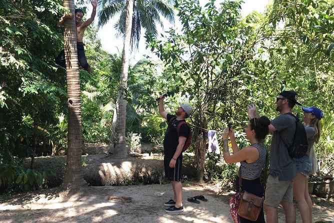 Authentic 'Non-Touristy' Mekong Delta Ben Tre 1 Day Private Tour - Coconut canals by sampan and rowing boat: the Ham Luong highlight