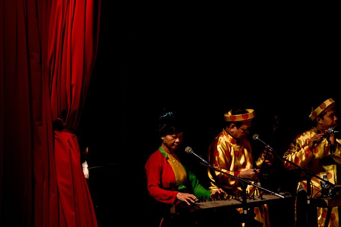 Authentic Vietnamese Dinner And Water Puppet Show - Orchestra music and the language factor