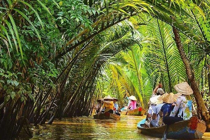 BIG BOSS private LIMOUSINE DAY TRIP TO MEKONG DElTA - Morning start: air-conditioned ride to My Tho and the Buddha stop