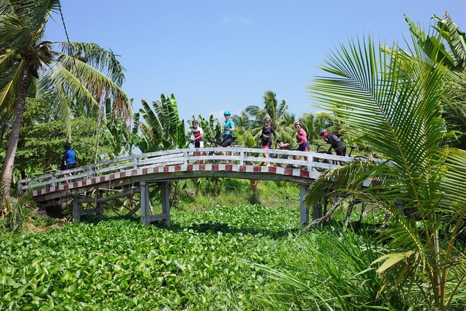 Bike And Boat Mekong Delta Cycling Tour - River Overpass Snack Breaks and the Support Van Option