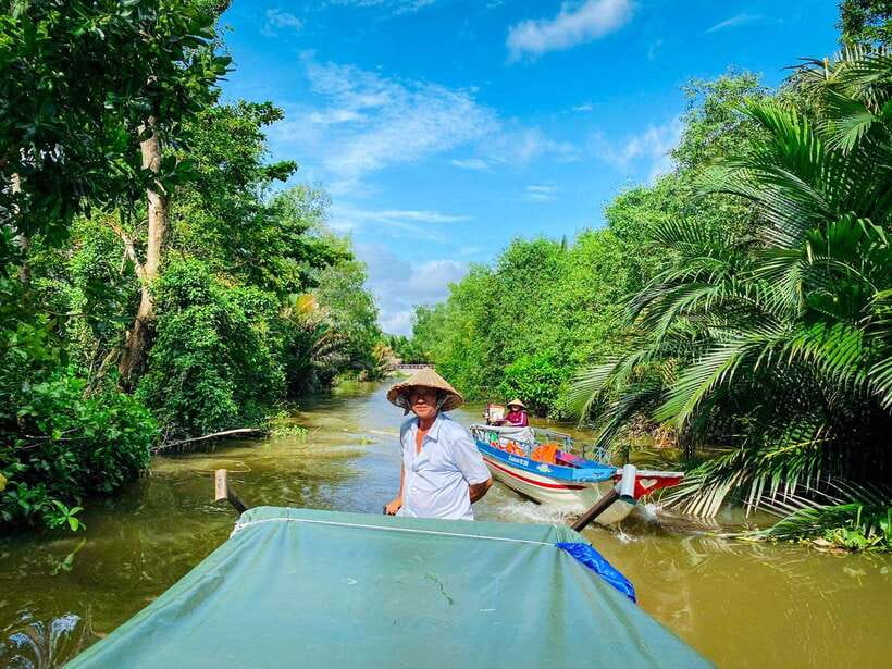 Can Tho: Explore Mekong, Floating Market, Cacao & Local Life - Moving from market to local boat life, fresh pineapple, and the fish-and-produce world