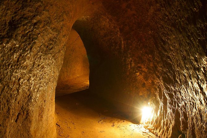 Chu Chi Tunnel With Cao Dai Temple Tour From Ho Chi Minh - Tea, cassava, and tying food to survival