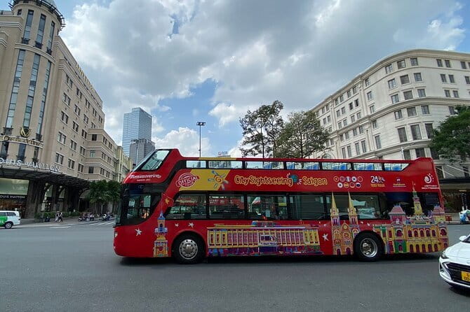 City Sightseeing Saigon Bus Tour - Blue Route: Pham Ngu Lao, Flower Market, and Pagoda Stops