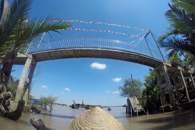 Cu Chi And Mekong Full Day Trip - Coconut Candy, Handicrafts, and Southern Music While You Eat Tropical Fruit