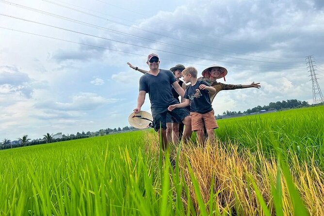 Cu chi Tunnel & Mekong Delta Full Day BBQ Lunch Lux Group 10 pax - Mekong Delta cruising: river life, bee farm, and playful photo moments