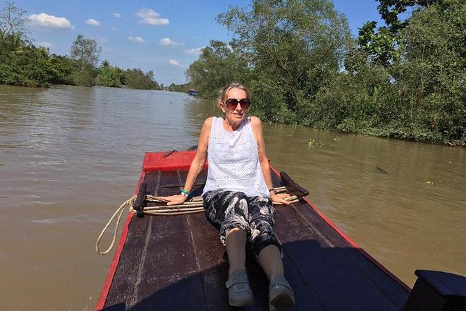 Cu Chi Tunnels and Mekong Delta 1 Day Full Day tour - Cu Chi Tunnels: underground maze, film context, and a quick snack break