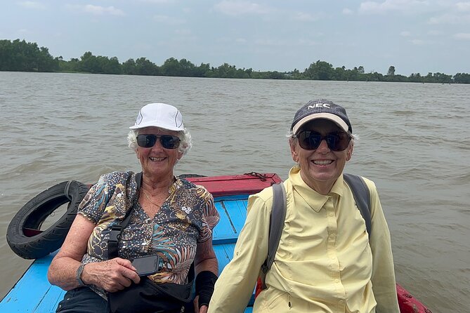 Cu Chi Tunnels History & Mekong Delta Culture River Cruise Tour - Pickup, transport, and the value of a good English guide