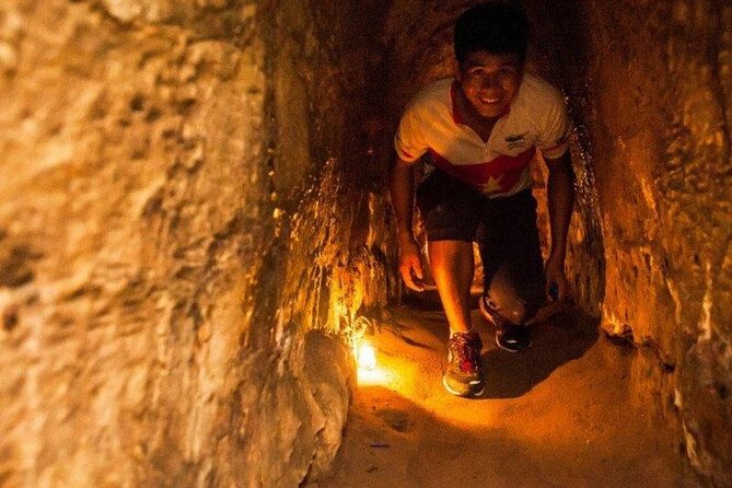 Cu Chi Tunnels underground half day tours - Photo through a trapdoor: more than a souvenir moment