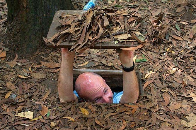 Cu Chi Tunnels underground half day tours - The morning logistics: District 1 pickup, A/C ride, and drive time