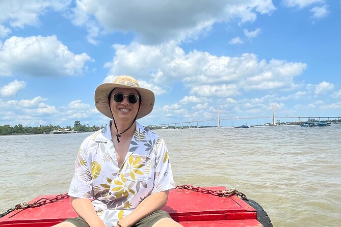 Deluxe Mekong Delta Tour to Floating Market 2 Days 1 Night Trip - Starting early from District 1: getting into the Delta on day one