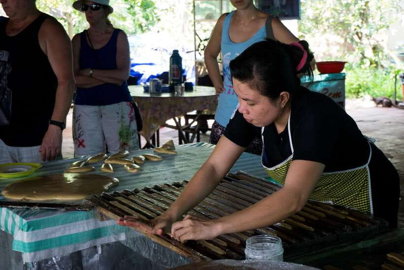Essential Mekong Delta: Highlight Tour from Ho Chi Minh City - Coconut Candy Mill and Lunch at a Local Restaurant