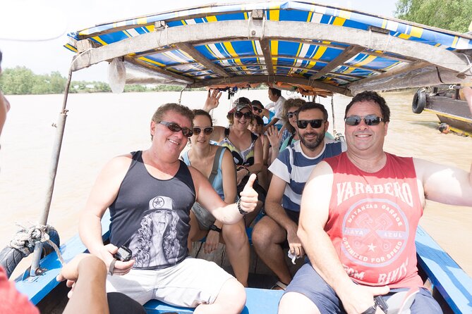 Essential Mekong Delta: Highlights Tour from Ho Chi Minh City - Tân Thạch canal on a sampan: shade, quiet water, and honey work