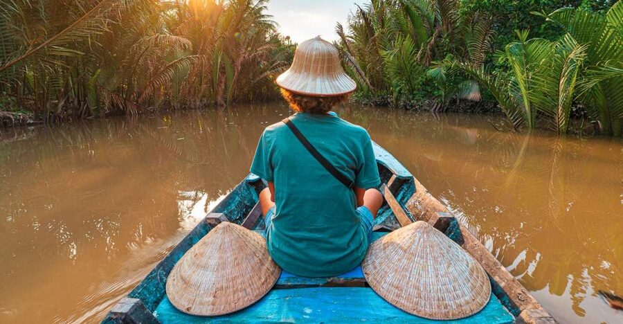 From Ho Chi Minh: Mekong Delta Private Day Tour - Bee farm honey tea, optional python viewing, and handmade coconut candy