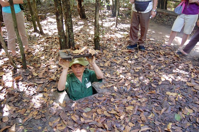 Full day Cu Chi Tunnels And Mekong Delta Guided Tour - Cu Chi Tunnels: video briefing, living spaces, and wartime survival