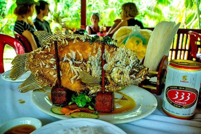 HCM:Mekong Delta Boat,Khotcake cooking Coconut Village,SmallGroup - Traditional Music, Fruit Tastings, and Lunch That Feeds You