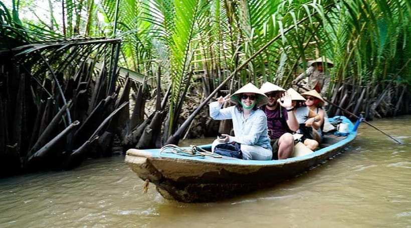 Ho Chi Minh City: Mekong Delta Tour with Sampan Journey - Ben Tre coconut country: candy, rice paper, and optional village time