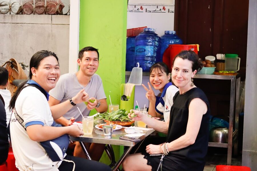 Ho Chi Minh City: Private Street Food Motorbike Tour - District 4 Finale: Seafood Meal, Flan, Beer, and Forest Banana Sticky Rice Wine