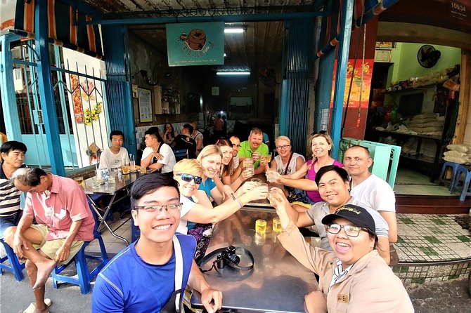 Ho Chi Minh city Street Food by scooter tour | female driver - Stop-by-stop: flower market, pancake lesson, and the 1968 apartment