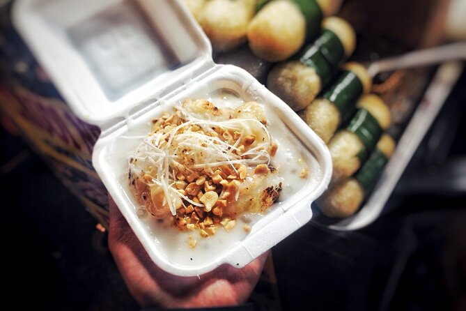 Ho Chi Minh City Street Food Tour & Sightseeing By Motorbike - Cambodian Market snacks, plus why the extra crackers matter