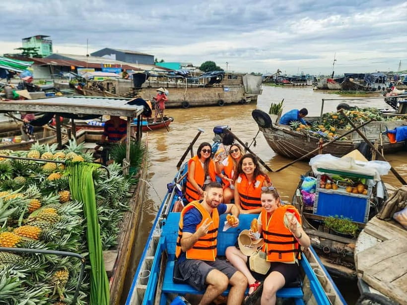 Ho Chi Minh: Group Cai Rang Floating Market 1 Day Tour - Cai Rang Floating Market on the water: breakfast, shaken noodles, braised coffee