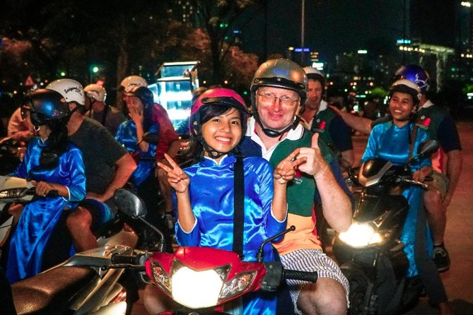 Ho Chi Minh Night Tour by Motorbikes with Female Rider | KissTour - The guide experience: safety, humor, and food explanations that make the night click