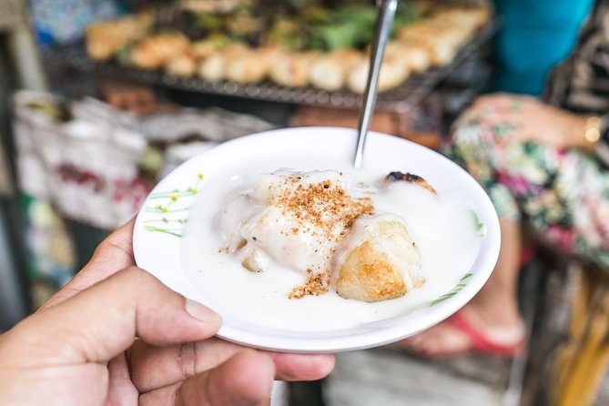 Ho Chi Minh Street Food Tour By Motorbike (Unique & Authentic) - Notre Dame Cathedral pass and the Ba Son Bridge skyline finish