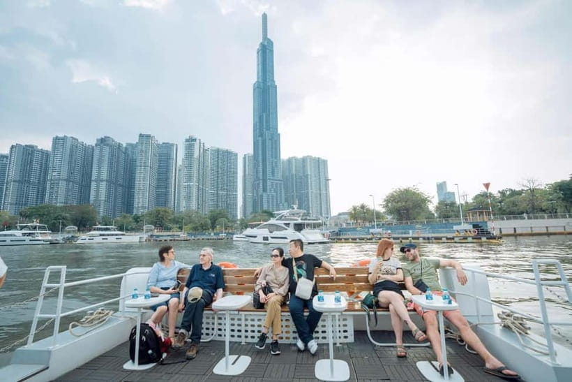 Lively Saigon River Sightseeing Cruise + Guided Walking Tour - On-board extras: ice cream and live music that actually fits the vibe