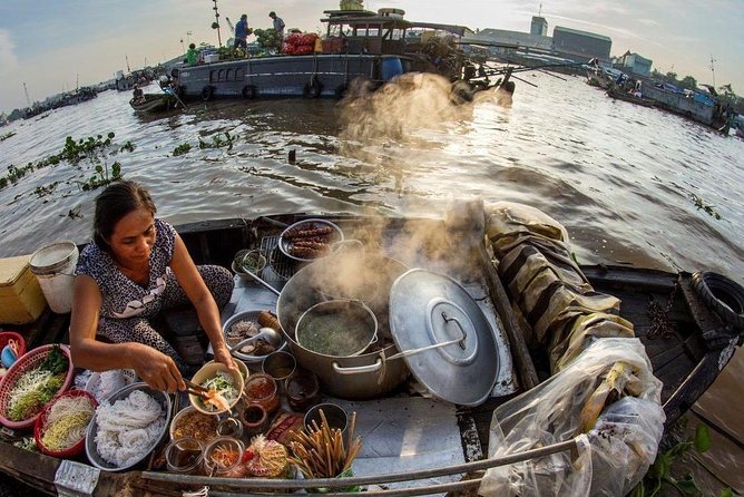 Mekong Delta 2-Day Tour: Floating Markets, Biking, Amazing Tour - Vinh Trang Pagoda: giant statues and a style-mix you can spot fast