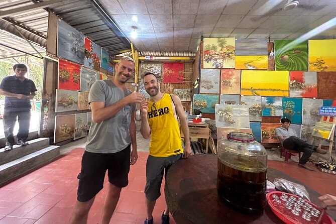 Mekong Delta Full Day Tour - Hand-rowed boat through narrow canals