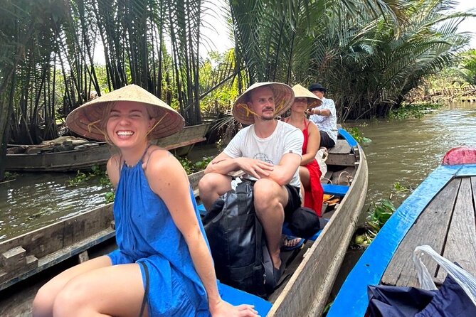 Mekong Delta Guided Tour from Ho Chi Minh City - Ben Tre Province: Palm-Rowing Moments, Fruit Stops, and Local Music