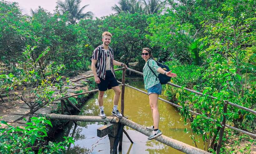 Mekong Delta 'Lesser-Known' My Tho & Ben Tre 1-Day Tour - My Tho on the Mekong: three boats and a coconut canal rhythm
