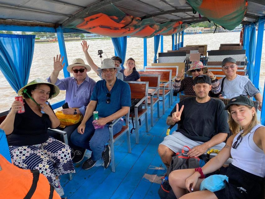Mekong Delta Private Tour from Ho Chi Minh City - Sampan boat ride: coconut-lined canals at human speed
