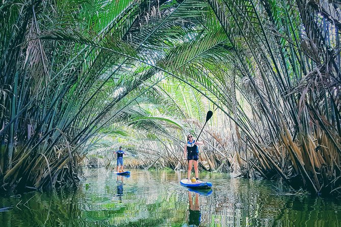 Paddling to explore the historic Vietnam War Rach Chiec jungle, - Private SUP on the Saigon River, plus Rach Chiec jungle history