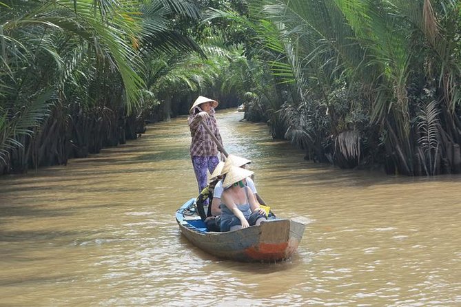 Private Cu Chi Tunnels and Mekong Delta: Full-Day Guided Tour - Inside the Cu Chi Tunnels: bamboo traps, rice paper, and real-world survival