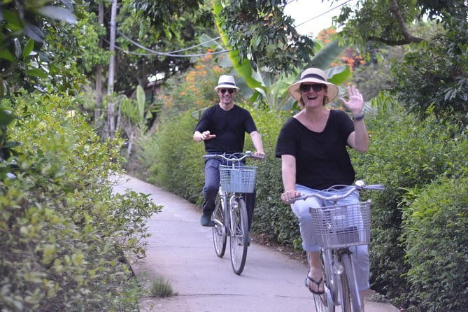 Private Mekong Delta tour to Cai Be – Tan Phong island full day - Cycling Through Orchards and Meeting the People Behind Cai Be