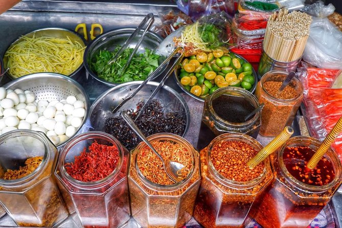 Private Saigon Street Food Tour with Motorbike - Stop 3: noodle soups from North, Central, South, or banh xeo