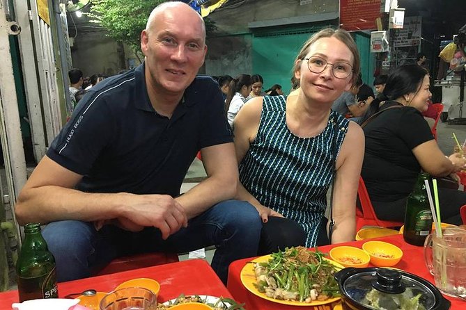 Private Saigon Street Food Tour with Motorbike - Stop 4: snail and seafood buffet, plus dessert