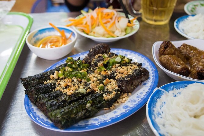 Private Street Food Tour by Motorbike in Ho Chi Minh City - Stop 1: the 10-dish start at Ho Chi Minh City