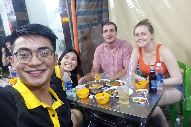 Private Street Food Tour by Scooter with Hotel Pickup - Entering Ho Chi Minh City’s night food scene from your hotel