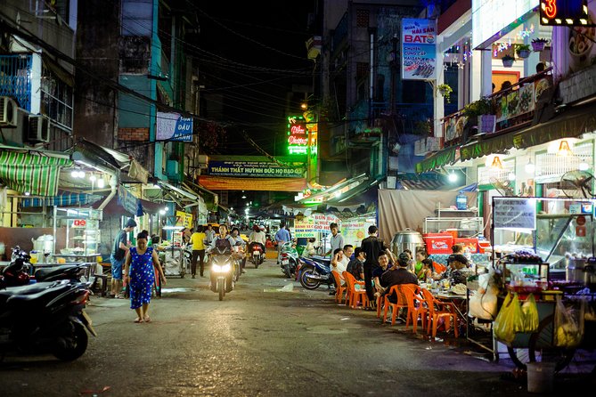 Private Vegan Food Tour By Scooter in Ho Chi Minh City - District 5 nightlife streets, then District 4 river lights