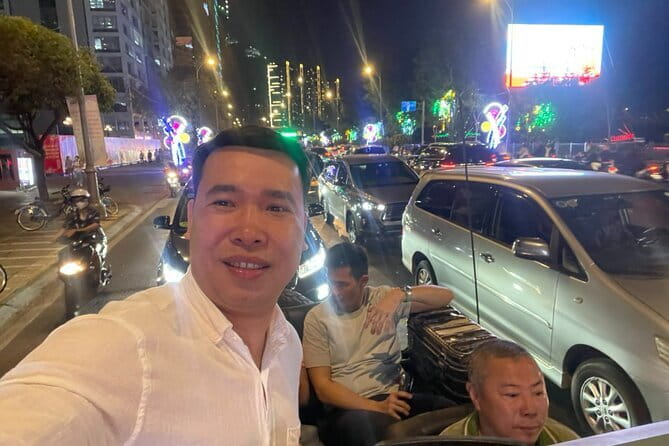 Saigon After Dark Foodie Tour by Army Open Air Jeep 4 Hours - Stop 1: Saigon Opera House and Nguyen Hue Street at night