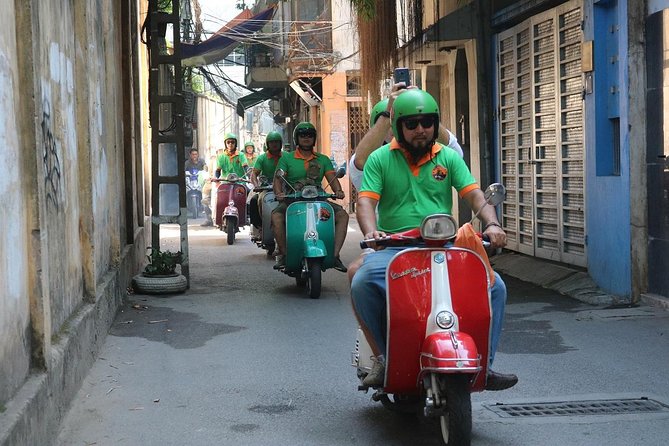 Saigon After Dark Vespa Street Food Tour + Live Music 4 hours - Banana cake stop, where the stories make the food stick