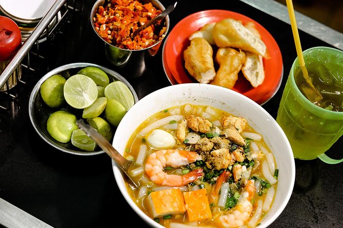 Saigon Backstreets City Tour on Scooter including Food - Lunch time: com tam or bun bo, plus how to choose what to eat