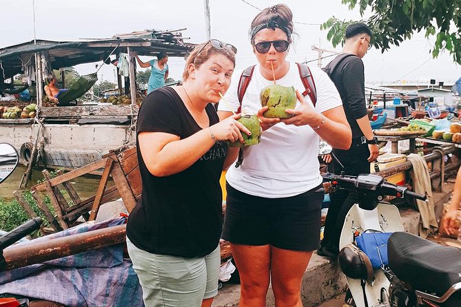 Saigon Night Sights & Local Food by Motorbike| Opt: Ao Dai Riders - Stop 5 and 6: District 4, Floating-Market Fruit Smoothies, and Food Street