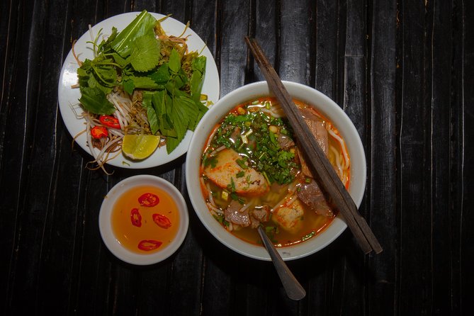 Saigon Night Street Food and City Tour on Scooter - The short sightseeing ride: night lights, cool air, and a reset