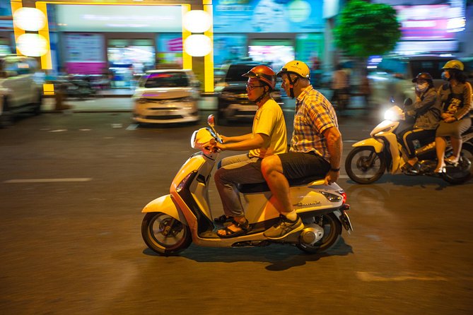 Saigon Night Street Food and City Tour on Scooter - Your guides make or break the experience