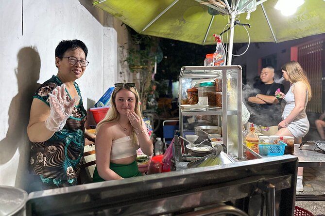 Saigon Night Walking Food Tour - 100% No Tourist - District 7 first stop: river-island food and mountain-region comfort